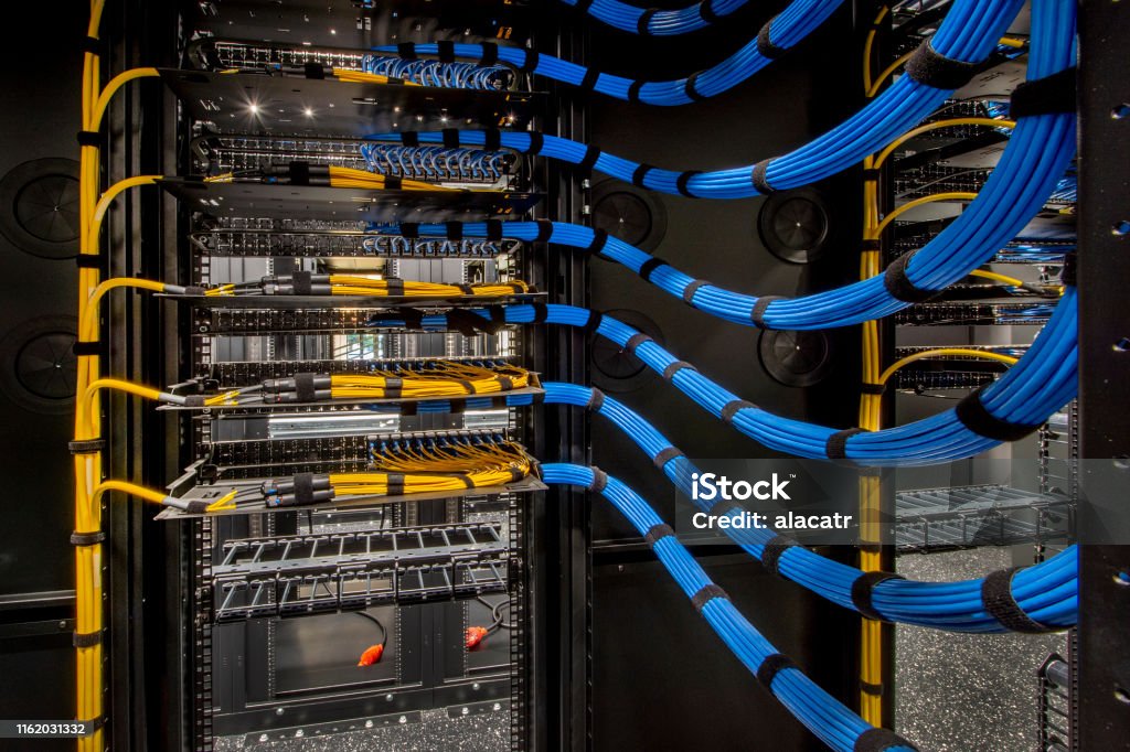 Fiber Optic and Cat 6 wiring in a server room.